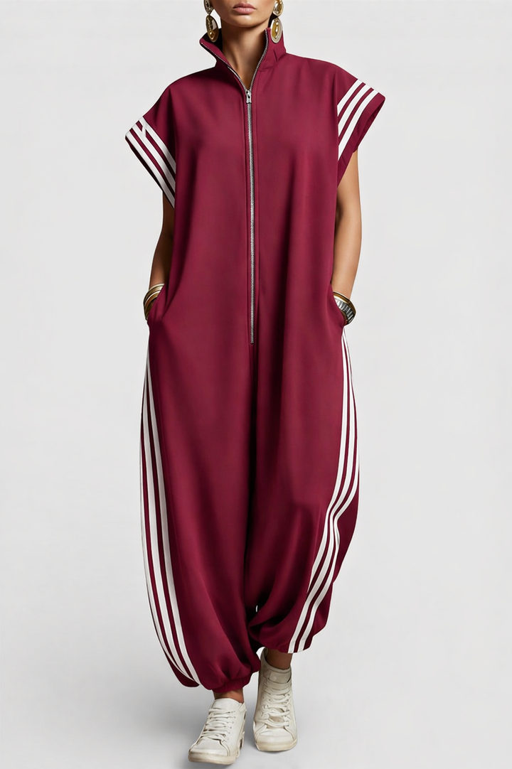 Elegant women's sleeveless zip neck jumpsuit. Comfortable casual or chic summer outfit. Effortless modern style.