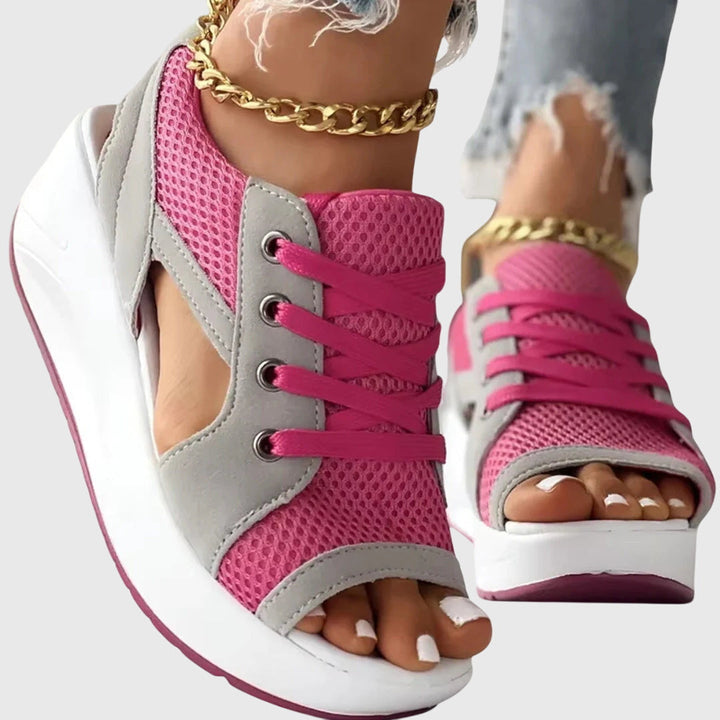 Trendy open-toe slip-on sandals for women with elevated sole, offering stylish summer comfort. Perfect casual footwear.