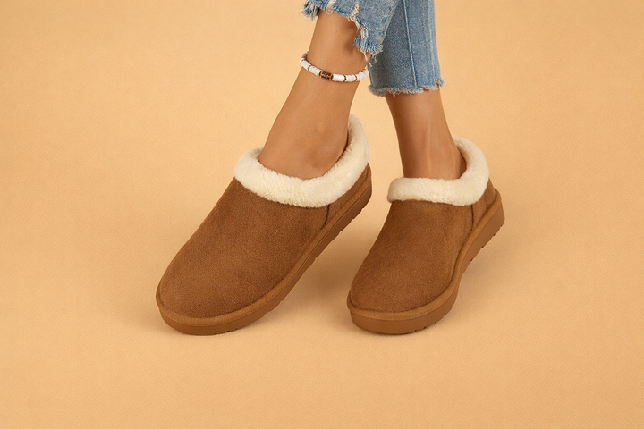 Comfortable women's slip-on winter boots, keeping feet warm & dry in snow.