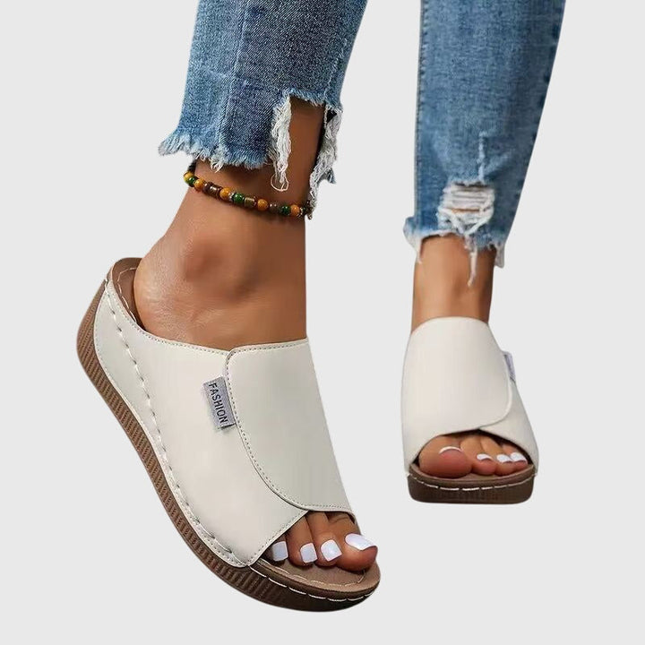Summer women's wedge sandals with an elegant stitched finish, perfect for casual style.