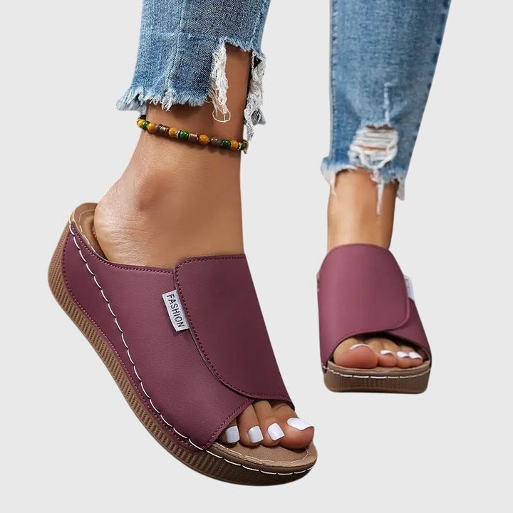Comfortable slip-on open-toe wedge sandals for women's easy summer fashion.