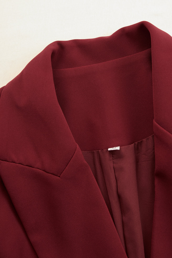 Elegant women's V-neck tailored blazer dress, ideal for office and professional events.