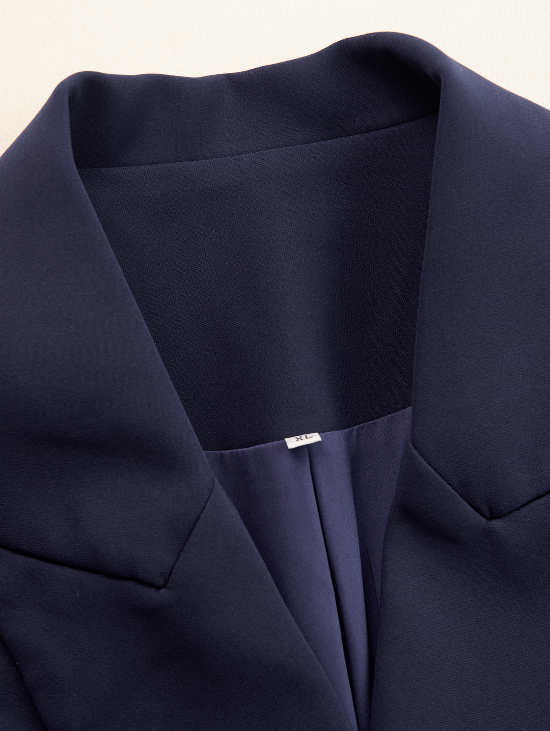 Stylish women's tailored blazer dress with V-neck, a chic & elegant midi for various occasions.