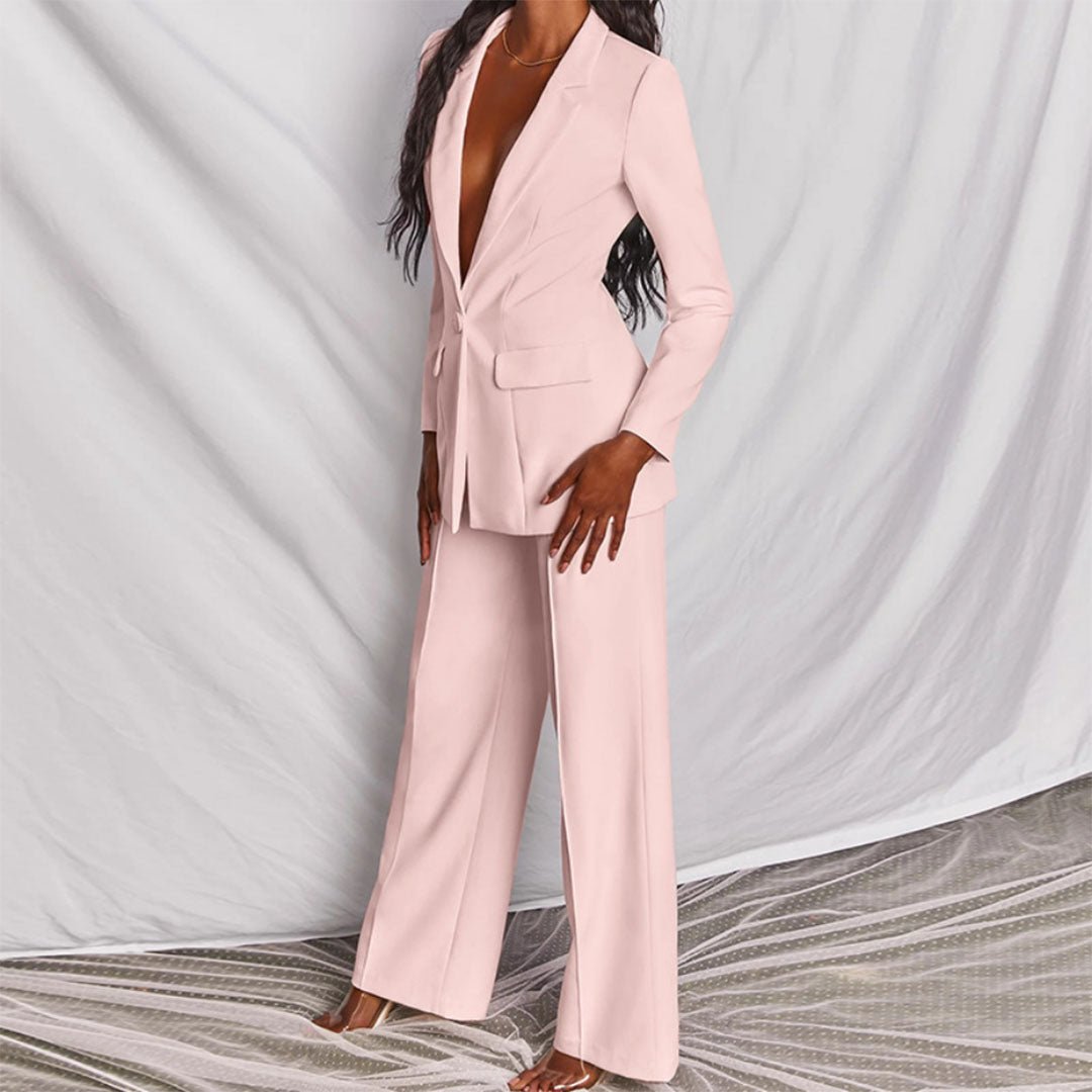 Smart casual women's two-piece outfit with an elegant blazer and matching trousers.