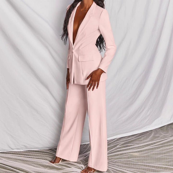 Smart casual women's two-piece outfit with an elegant blazer and matching trousers.