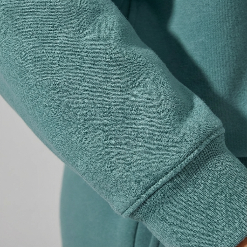 Elegant women's two-piece activewear set. Half-zip tracksuit with comfy joggers, perfect for gym or relax.