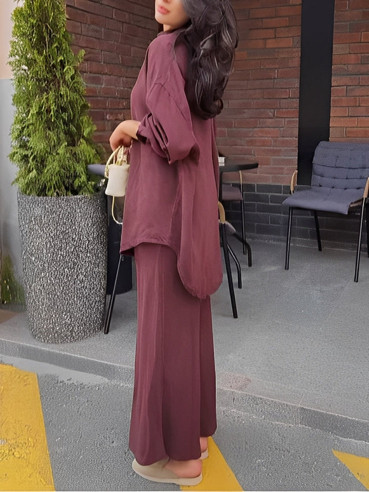 Stylish women's long sleeve button shirt and tie-waist maxi skirt set. Coordinated elegant fashion ensemble.