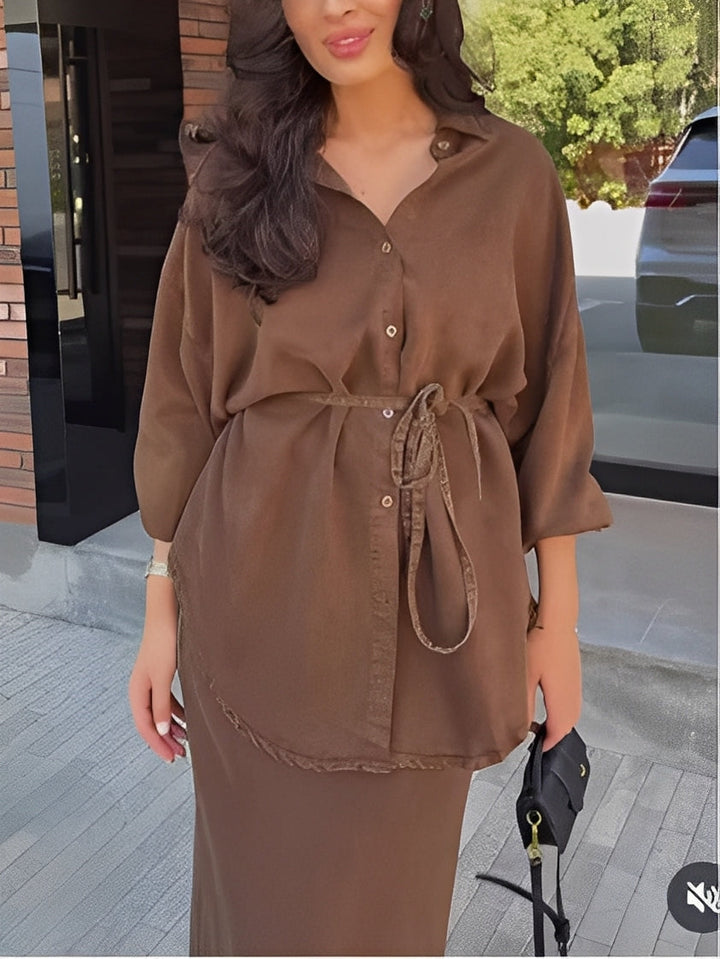 Elegant women's two-piece button shirt and maxi skirt set. Casual chic coordinated outfit for versatile style.