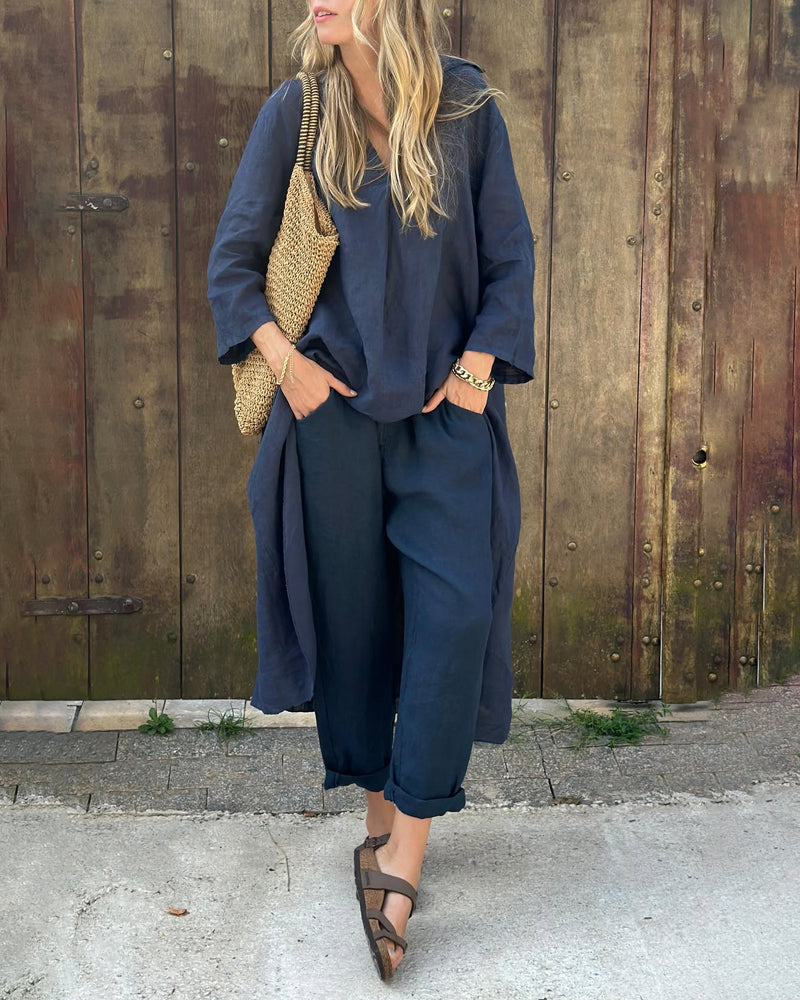 Women's stylish two-piece set with a breezy top & elegant trousers, perfect for comfortable summer casual wear.