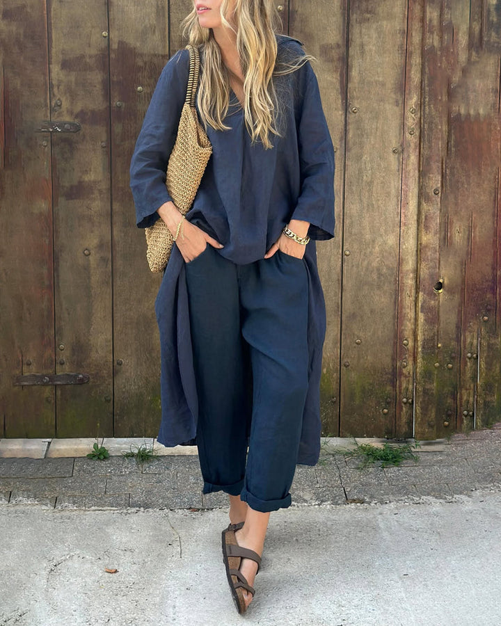 Women's stylish two-piece set with a breezy top & elegant trousers, perfect for comfortable summer casual wear.
