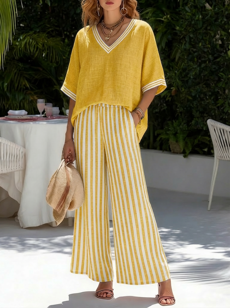 Plus size women's V-neck top & stripe pants set. Versatile two-piece outfit for stylish casual or elegant occasions.