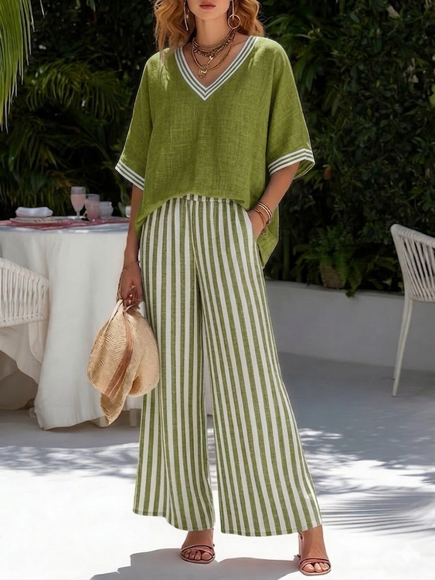 Women's fashion matching set: stylish V-neck top & stripe pants. Comfortable two-piece outfit for modern elegance.