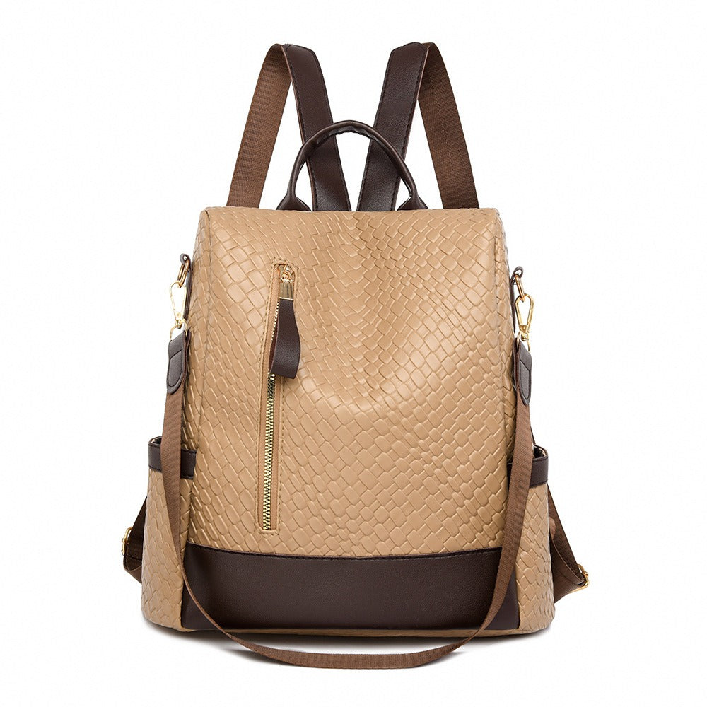 Chic and functional women's backpack made from water-repellent vegan leather with anti-theft features.
