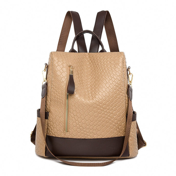 Chic and functional women's backpack made from water-repellent vegan leather with anti-theft features.