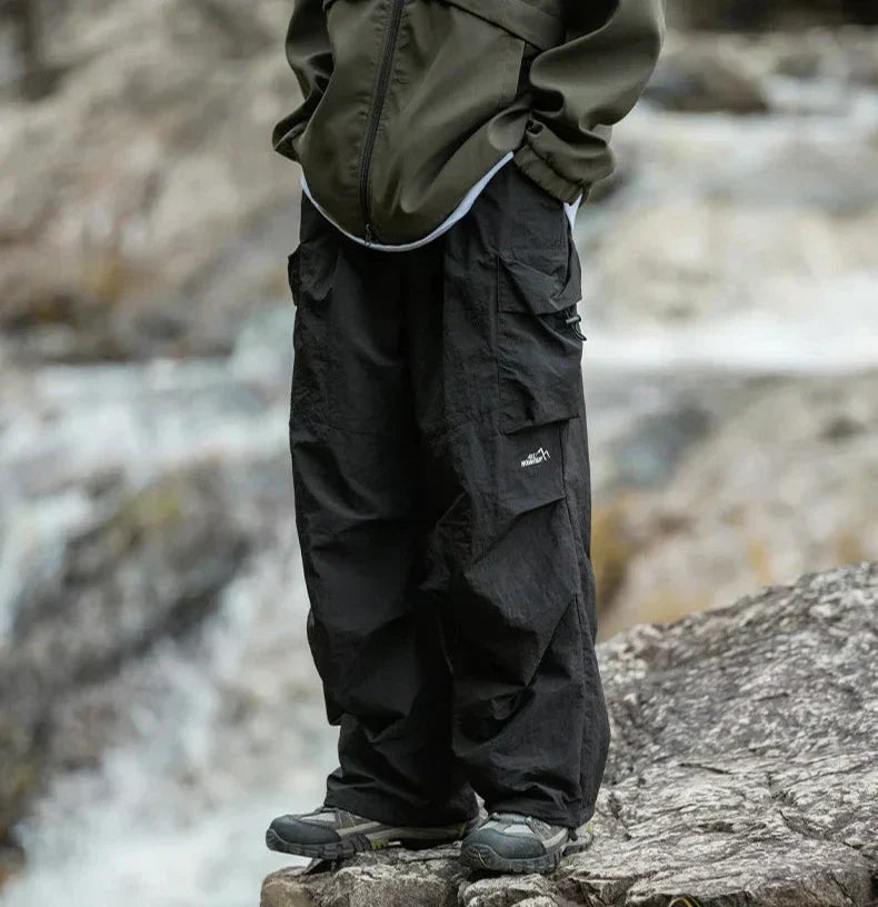 Folded women's casual waterproof outdoor pants, ready for travel & your next adventure.