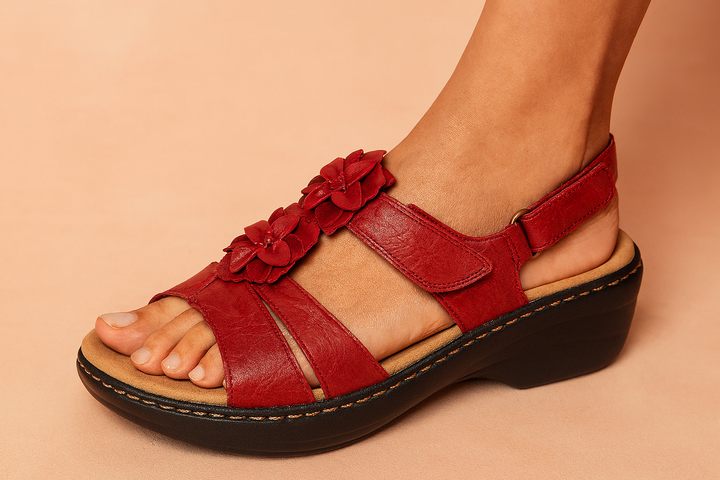 Elegant floral accent wedge sandals for women, ideal for evening or casual summer wear.