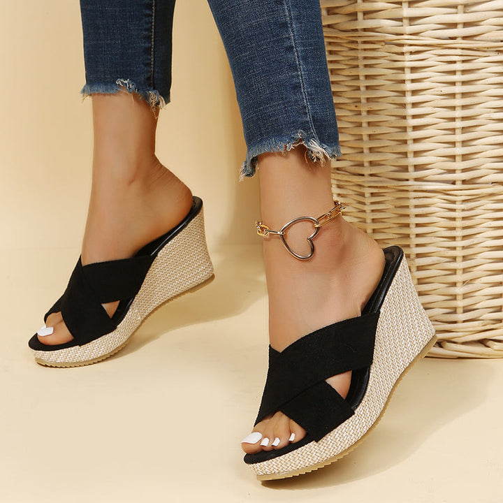 Chic open-toe women's wedge sandals, featuring stylish cross straps for both casual & dressy occasions.