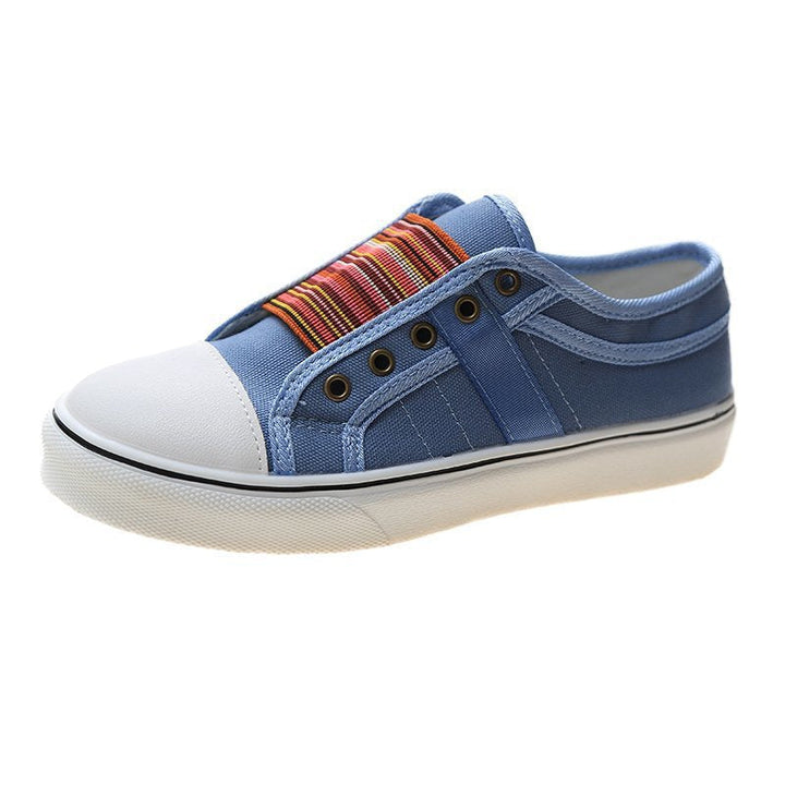 Women's stylish white everyday sneakers, comfortable and versatile for casual wear. Modern fashion trainers.