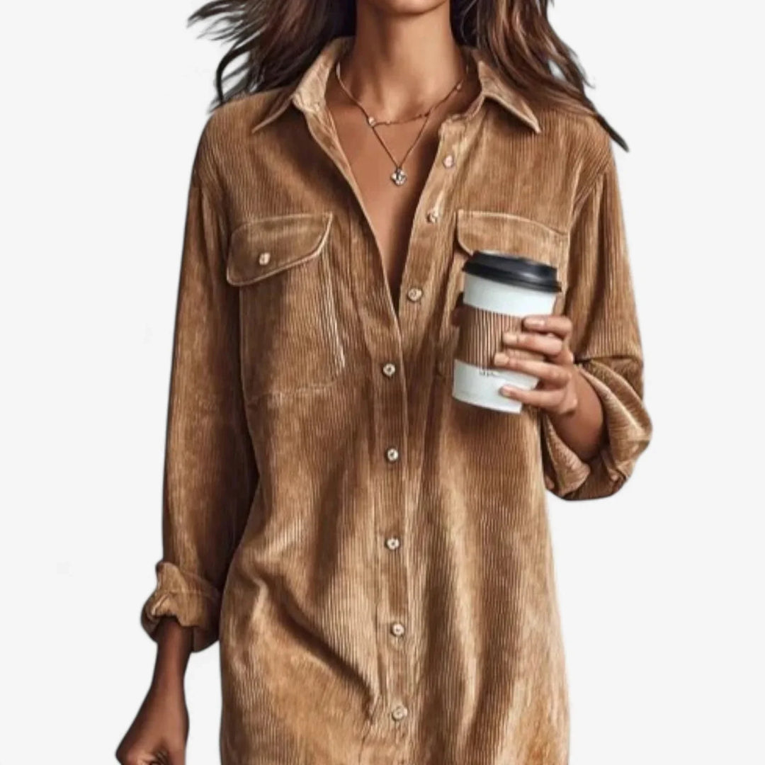 Comfortable women's midi shirt dress with pockets. Relaxed fit, collared, ideal for casual or elegant looks.
