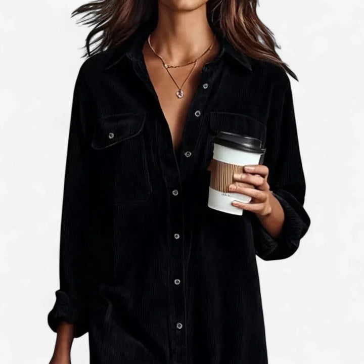 Elegant women's collared midi dress. Versatile shirt dress with wide cut, button front, and convenient pockets.