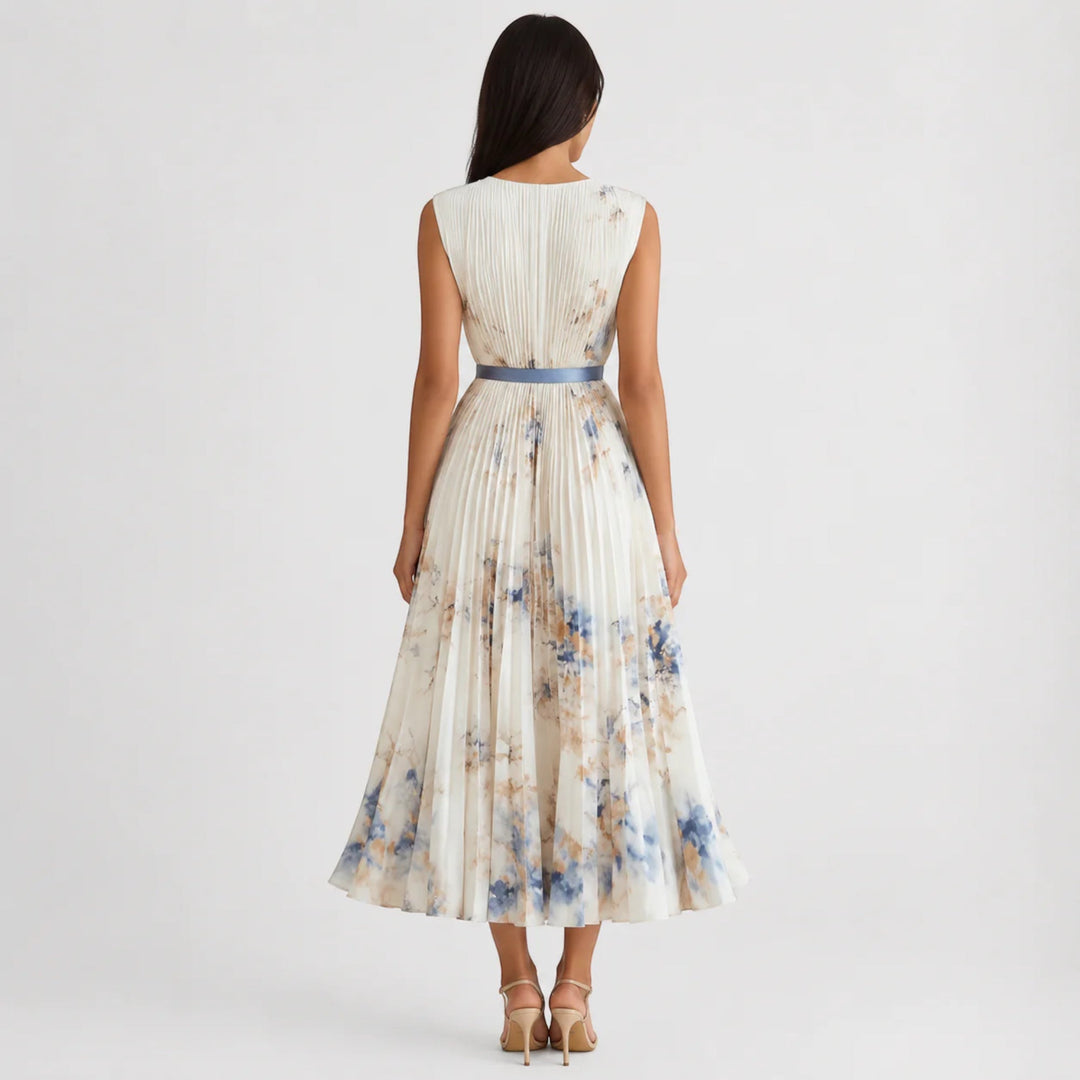 Pleated A-Line women's midi dress, vibrant floral pattern, sleeveless summer style.