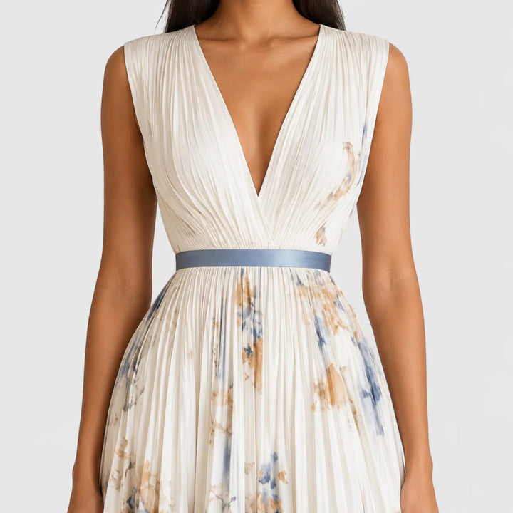 Sleeveless women's midi dress, floral pleated A-line, perfect for summer casual outings.