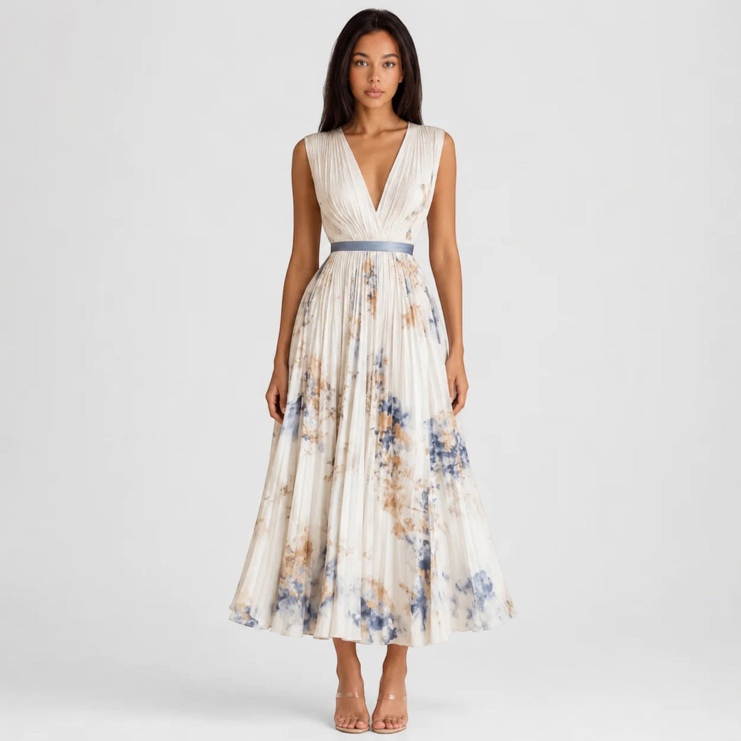 Sophisticated women's sleeveless floral midi dress with a pleated A-line skirt, perfect for summer.