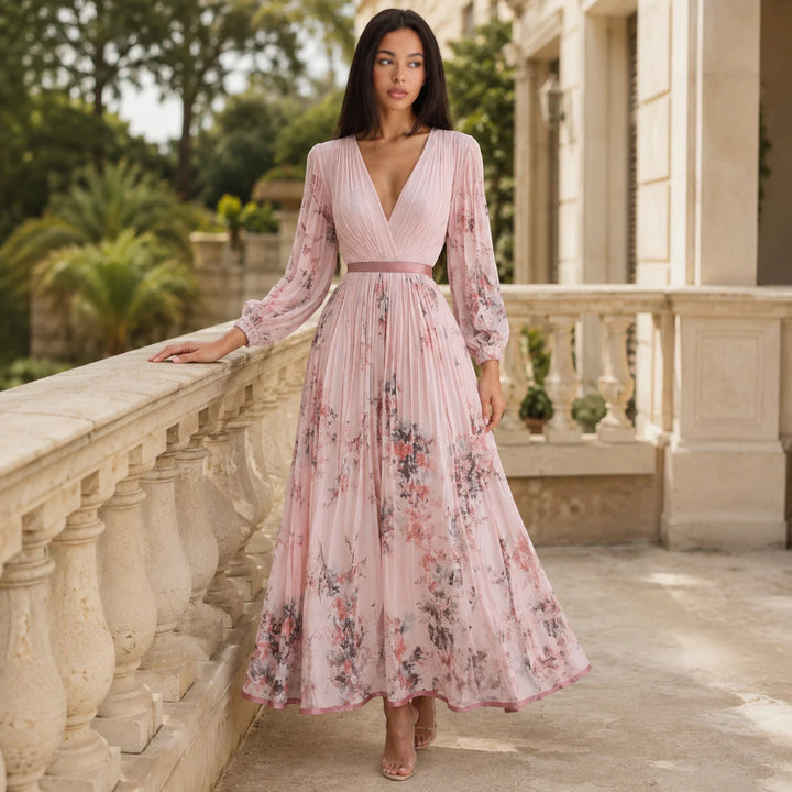 Floral pleated A-line women's midi dress, sleeveless & casual for warm summer days.
