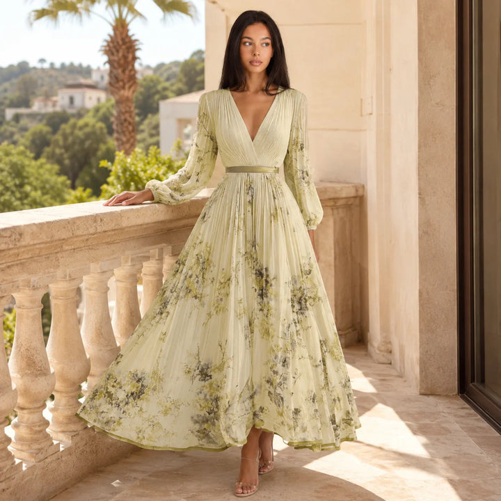 Elegant sleeveless women's floral midi dress, pleated A-line, ideal for summer parties.