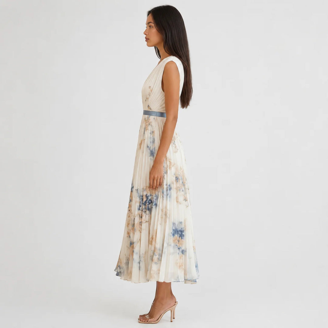 Women's floral pleated A-line midi dress, V-neck, versatile for casual or party summer wear.