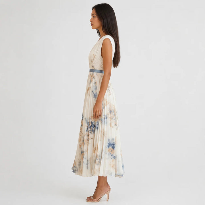 Women's floral pleated A-line midi dress, V-neck, versatile for casual or party summer wear.