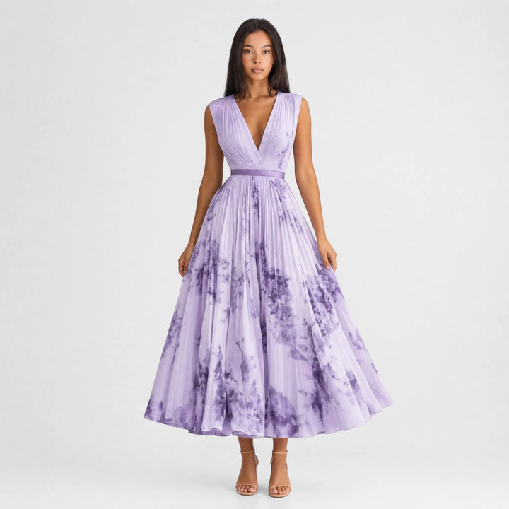 Women's summer sleeveless pleated A-Line midi dress with a beautiful floral pattern.