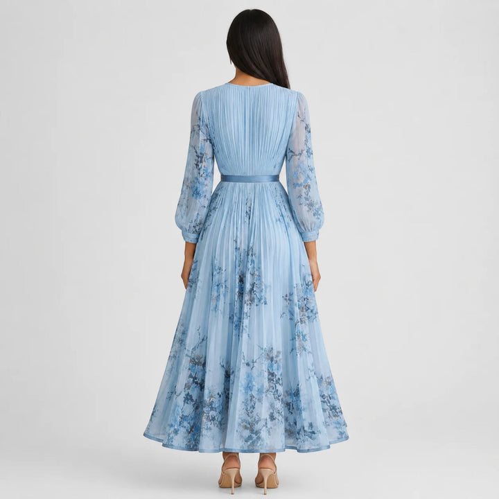 Sophisticated women's summer midi dress, floral pleated A-line cut, great for vacation.