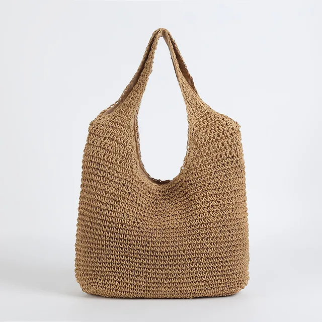 Women's summer straw beach bag with comfortable shoulder strap, perfect for vacation and casual wear.