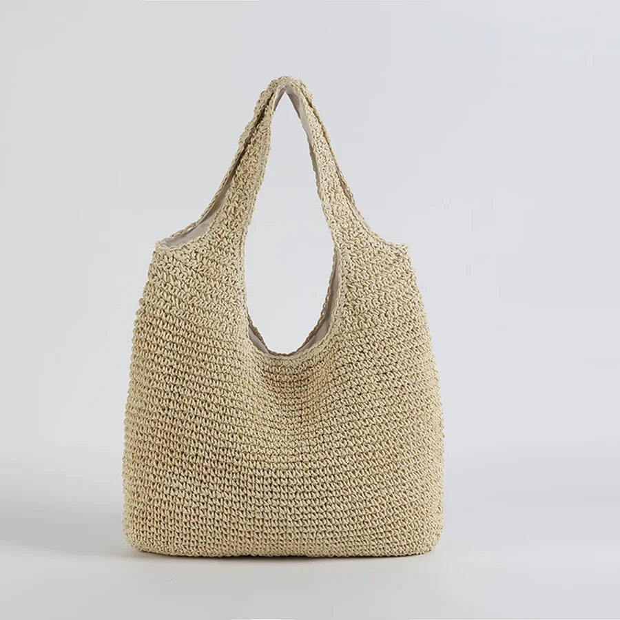 Trendy women's straw shoulder bag, spacious hobo style beach bag for summer vacations & casual use.