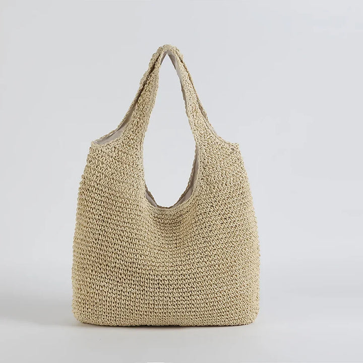 Trendy women's straw shoulder bag, spacious hobo style beach bag for summer vacations & casual use.