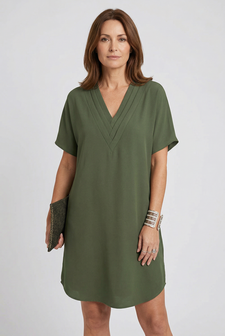 Women's summer V-neck mini dress with flowy short sleeves. Casual & elegant day or evening wear.