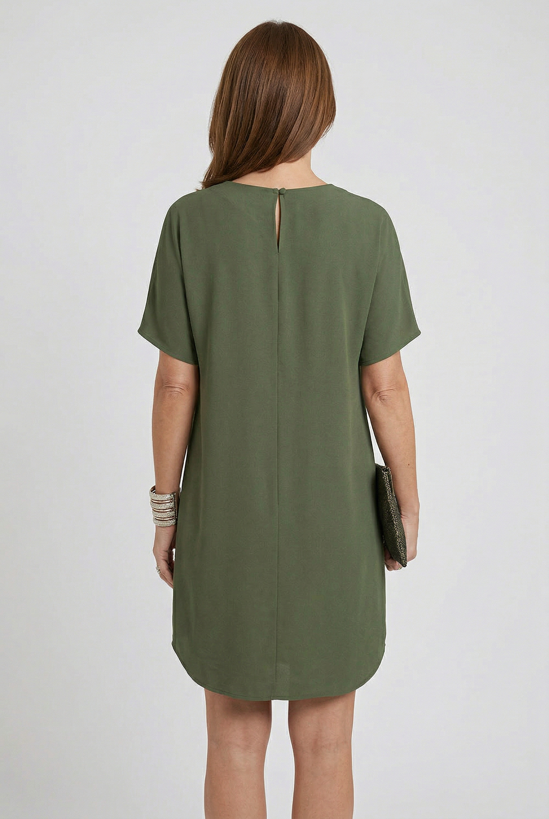 Comfortable women's flowy V-neck mini dress. Stylish short sleeve summer apparel for versatile wear.