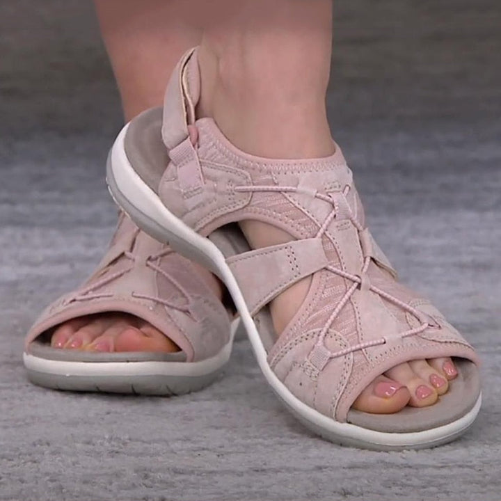 Supportive women's sandals for everyday wear, featuring a contoured footbed.