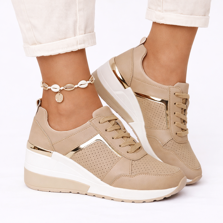 Stylish women's wedge trainers for everyday comfort & support, perfect for casual walking.
