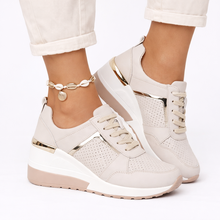 Versatile women's comfort wedge trainers with supportive design for active everyday use.