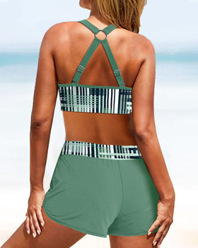 Modern women's high-waist bikini shorts set with supportive top & contrast panel. Ideal two-piece active beachwear.