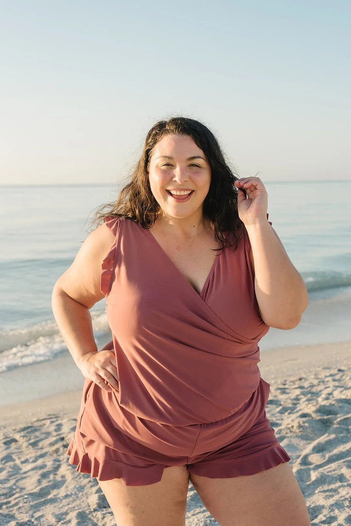 Vacation-ready women's supportive swimsuit with a built-in bra, ideal for summer beach days.
