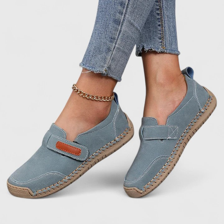 Women's supportive orthopaedic slip-on shoes for comfortable everyday wear & foot health.