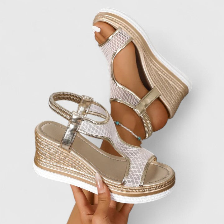 Comfortable women's wedge sandals with arch support, ideal for all-day wear & casual style.