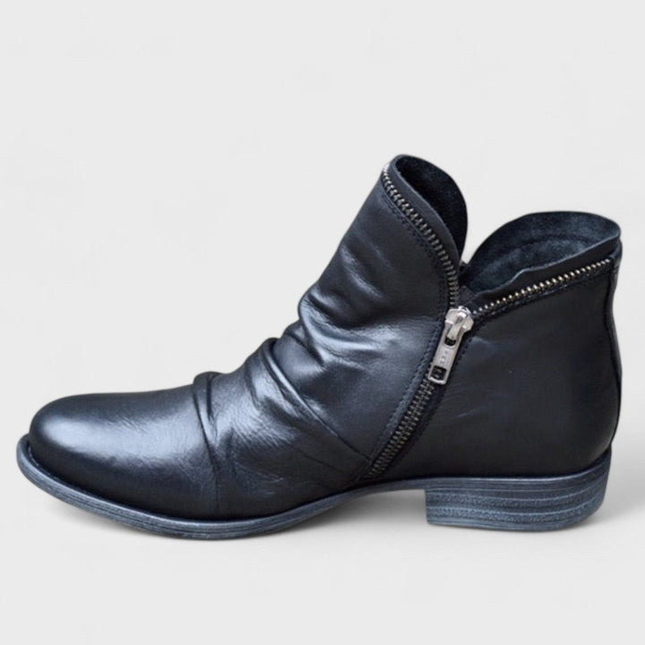 Chic women's ankle boots, providing orthopedic support & comfort. Versatile fashion boots for everyday wear.