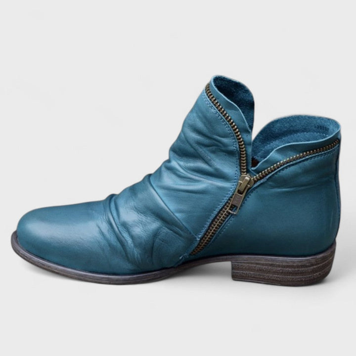 Comfortable women's orthopedic ankle boots, perfect for walking. Supportive footwear with elegant style.