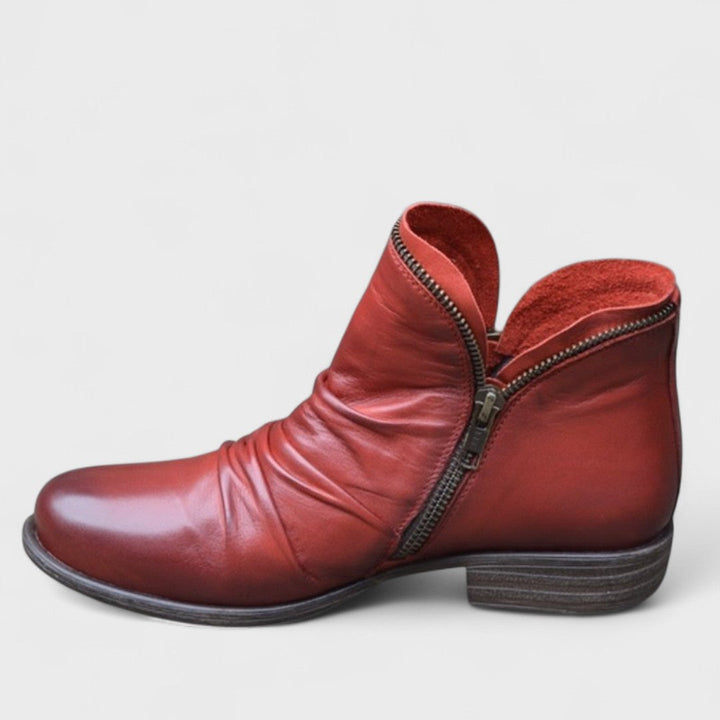 Elegant women's ankle boots with orthopedic support for ultimate comfort. Stylish & versatile everyday footwear.