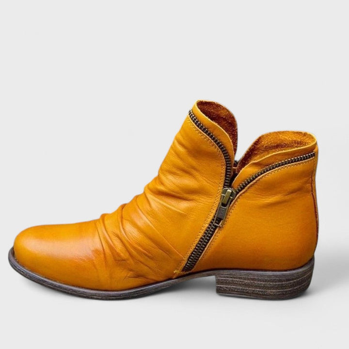 Women's orthopedic ankle boots ensuring all-day comfort & support. Chic, versatile footwear for active women.
