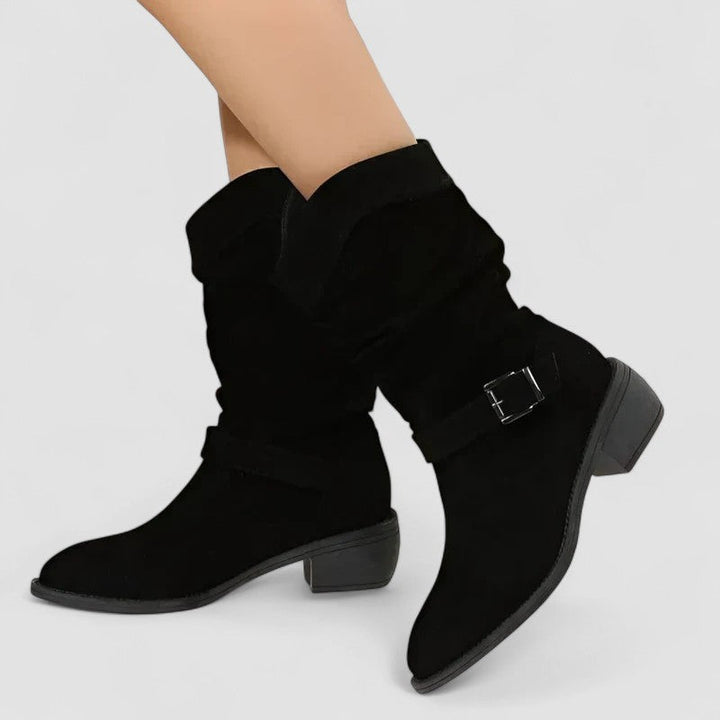 Supportive women's ankle boots with side zip, offering orthopedic comfort & easy wear.